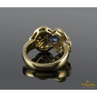 Sortija en oro amarillo y oro blanco con un zafiro y brillantes