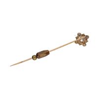 Aguja de corbata realizada en oro amarillo y oro blanco con brillantes.