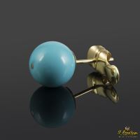 Pendientes realizados en oro amarillo y bolas de turquesa.