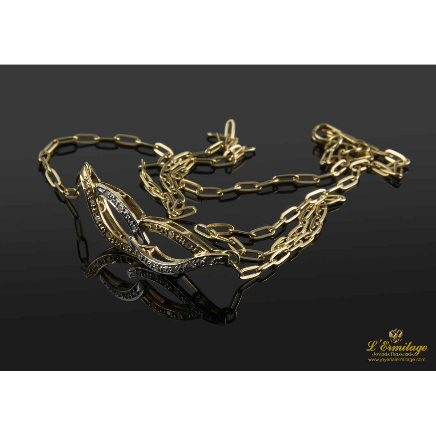 Collar realizado en oro amarillo y oro blanco y colgante con brillantes