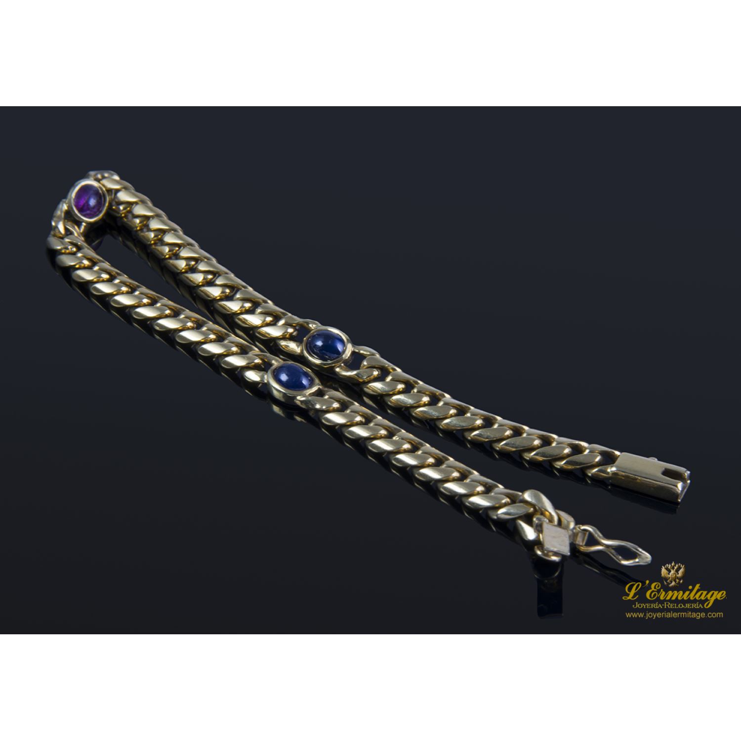 Pulsera en oro amarillo con rubí y zafiros