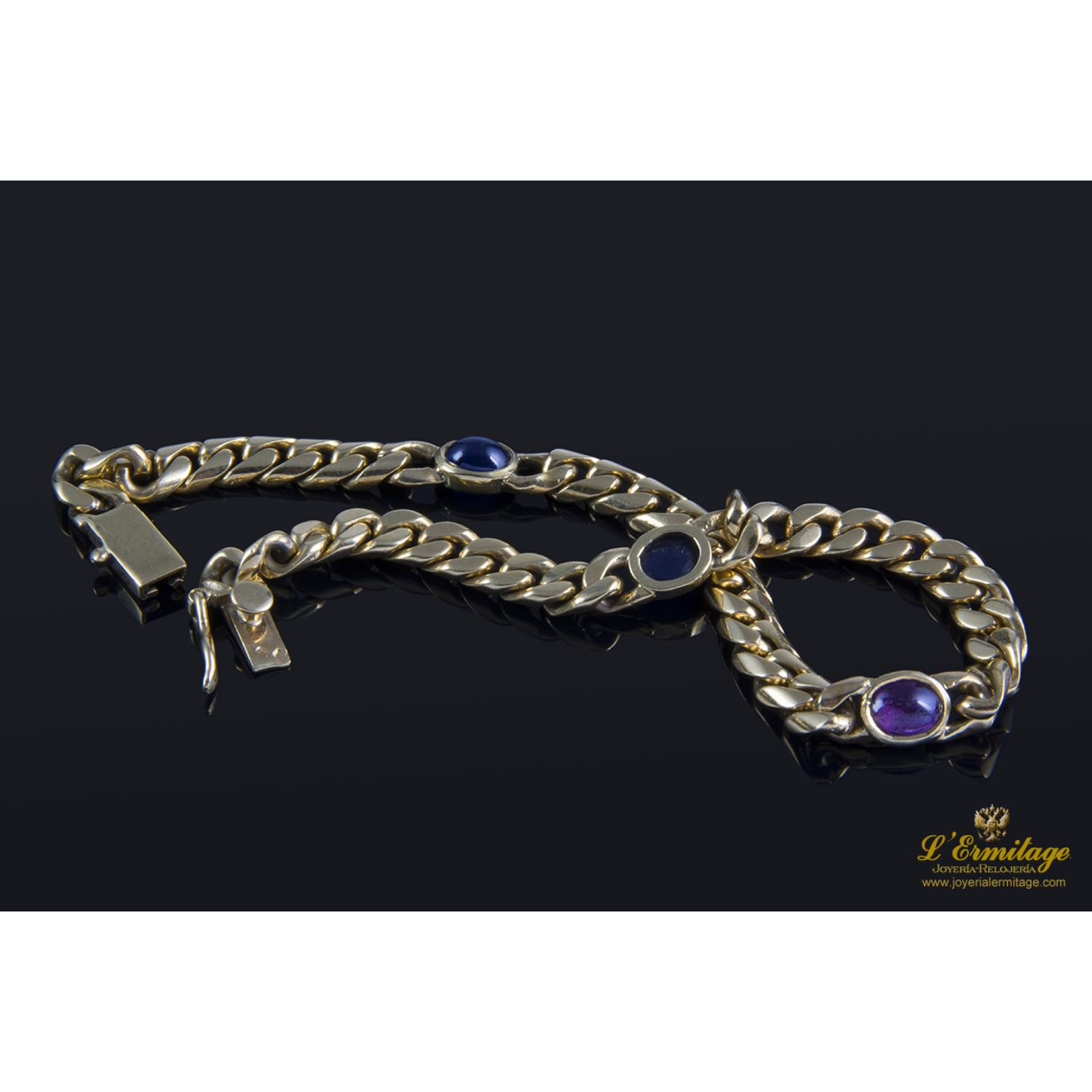 Pulsera en oro amarillo con rubí y zafiros