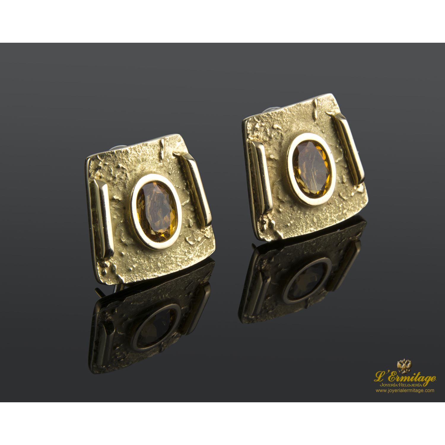 Pendientes en oro amarillo con topacios