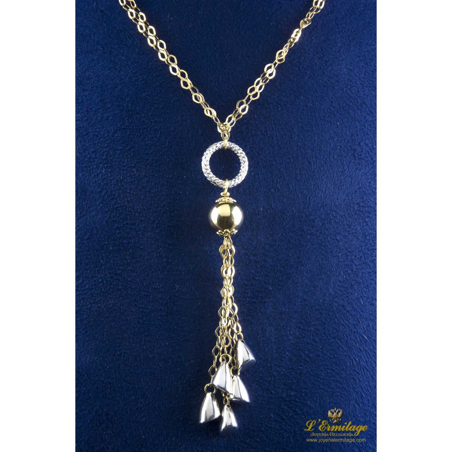 Cadena doble de anillas realizada en oro blanco y oro amarillo.