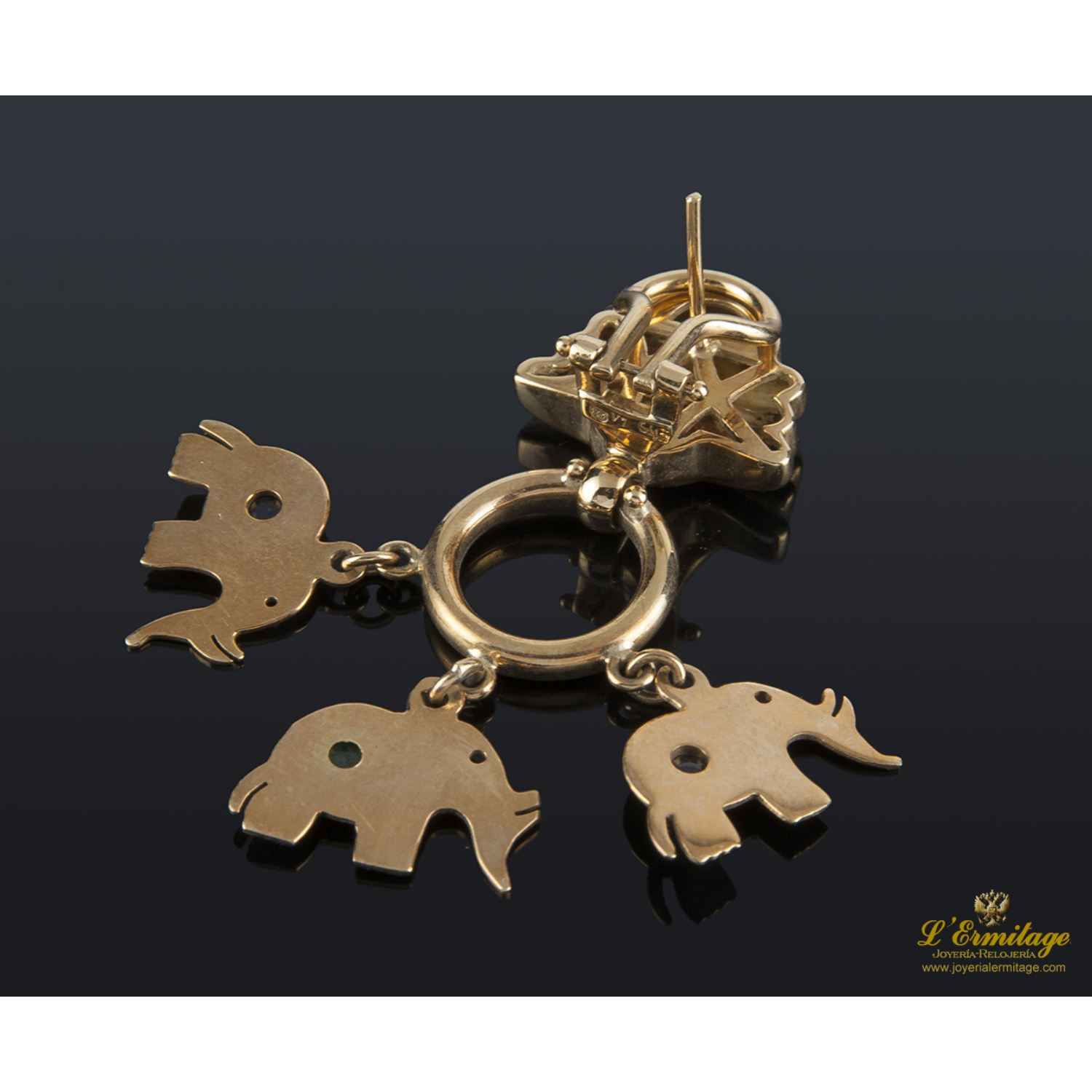 Pendientes elefantes colgantes en oro amarillo, esmeraldas y zafiros.