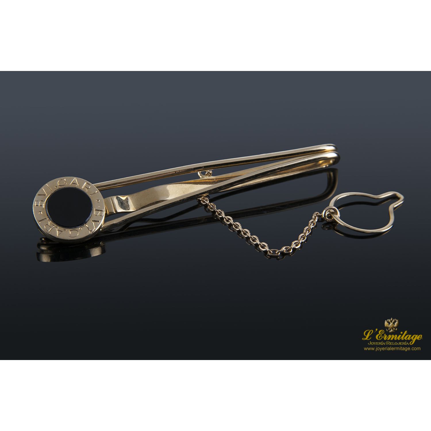 Pisacorbatas oro amarillo y ceramica