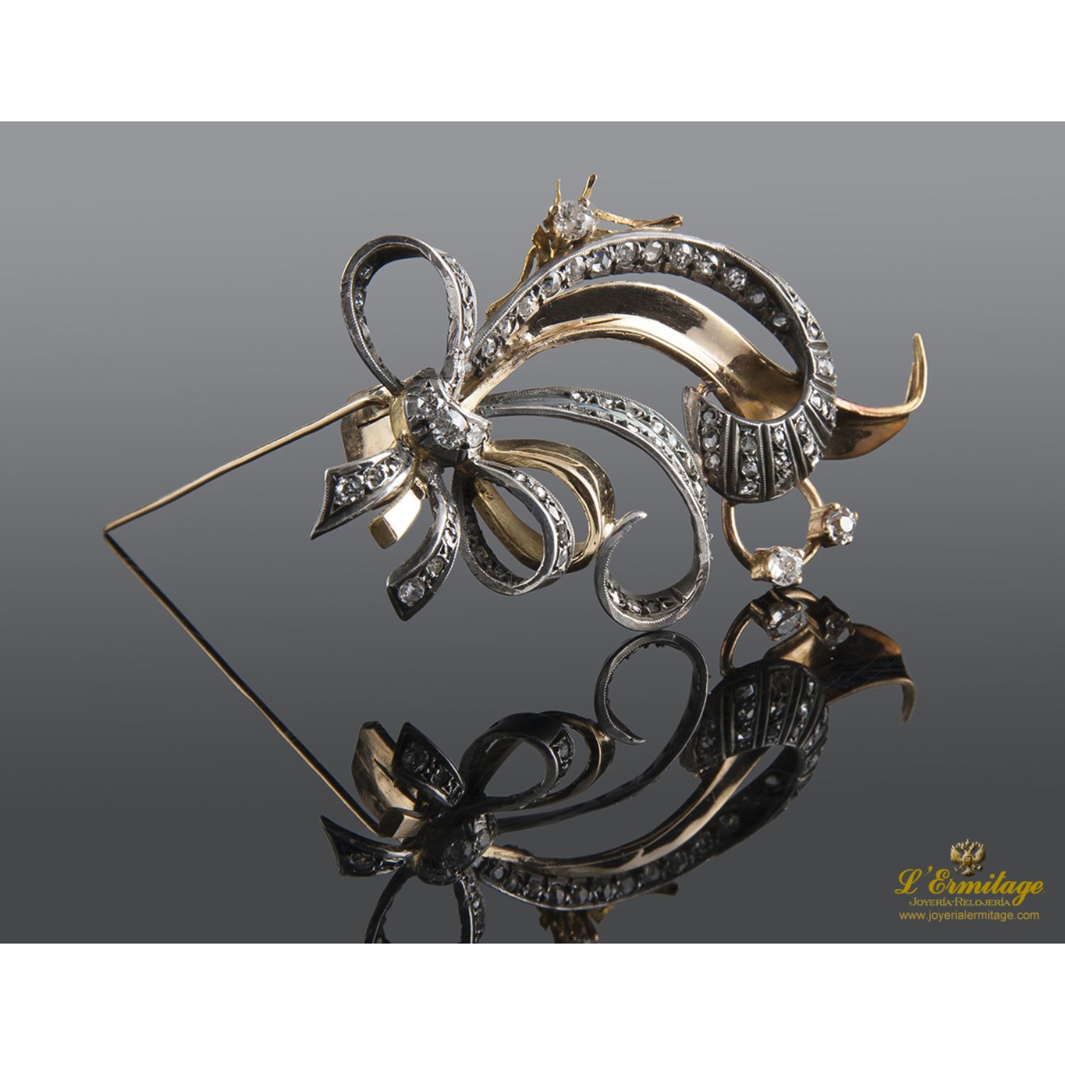 Broche antiguo oro amarillo y plata con diamantes