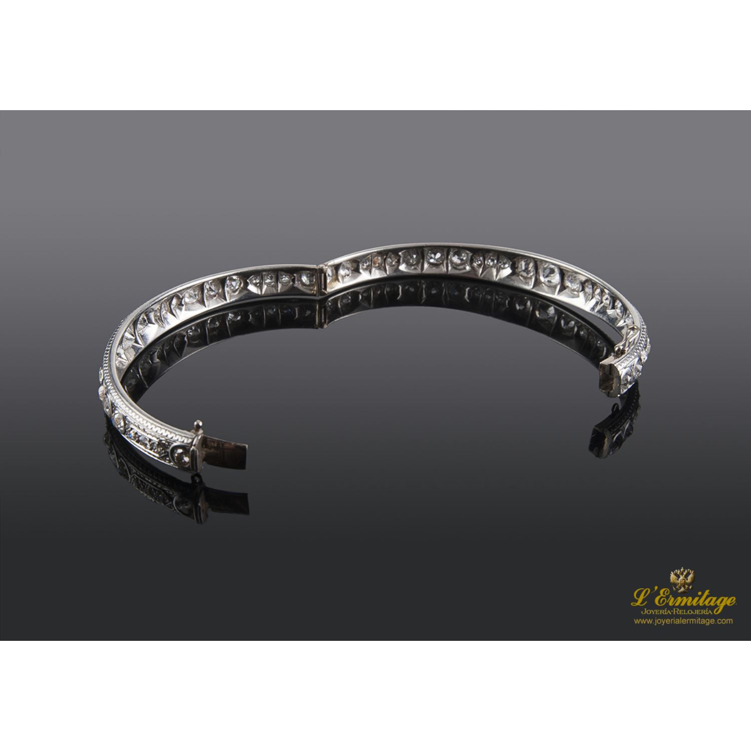 Pulsera platino de media caña y diamantes talla antigua