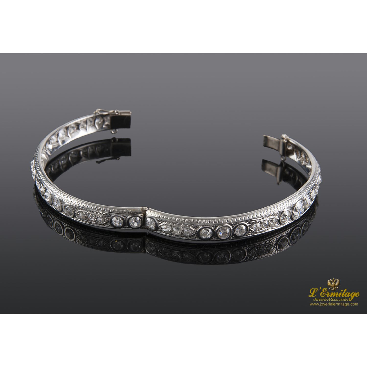 Pulsera platino de media caña y diamantes talla antigua