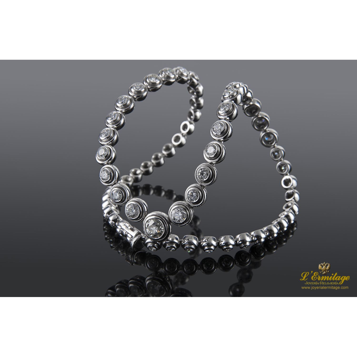 Gargantilla riviere oro blanco diamantes engastados  en chatones