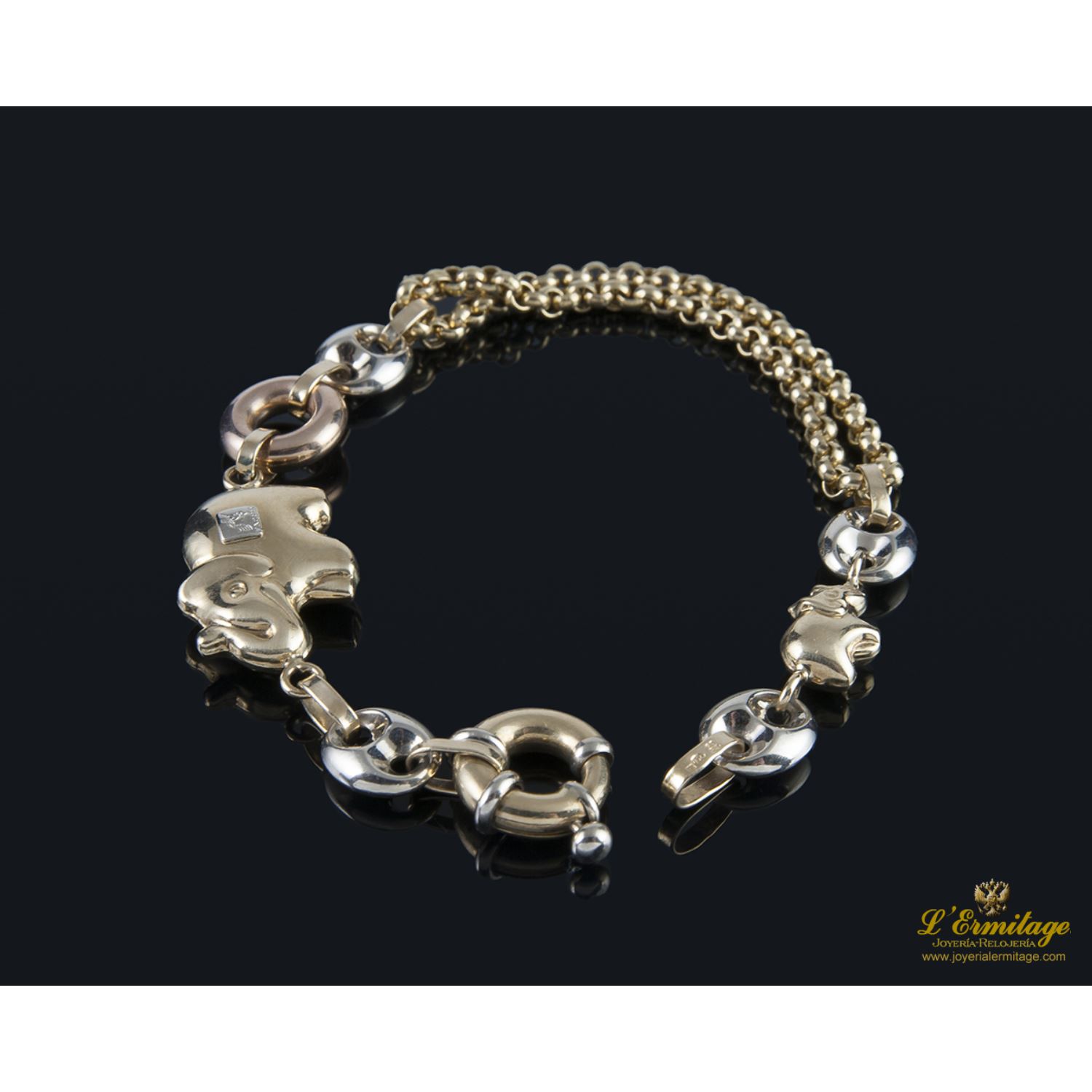 Pulsera tres oros con motivos referente a elefantes.