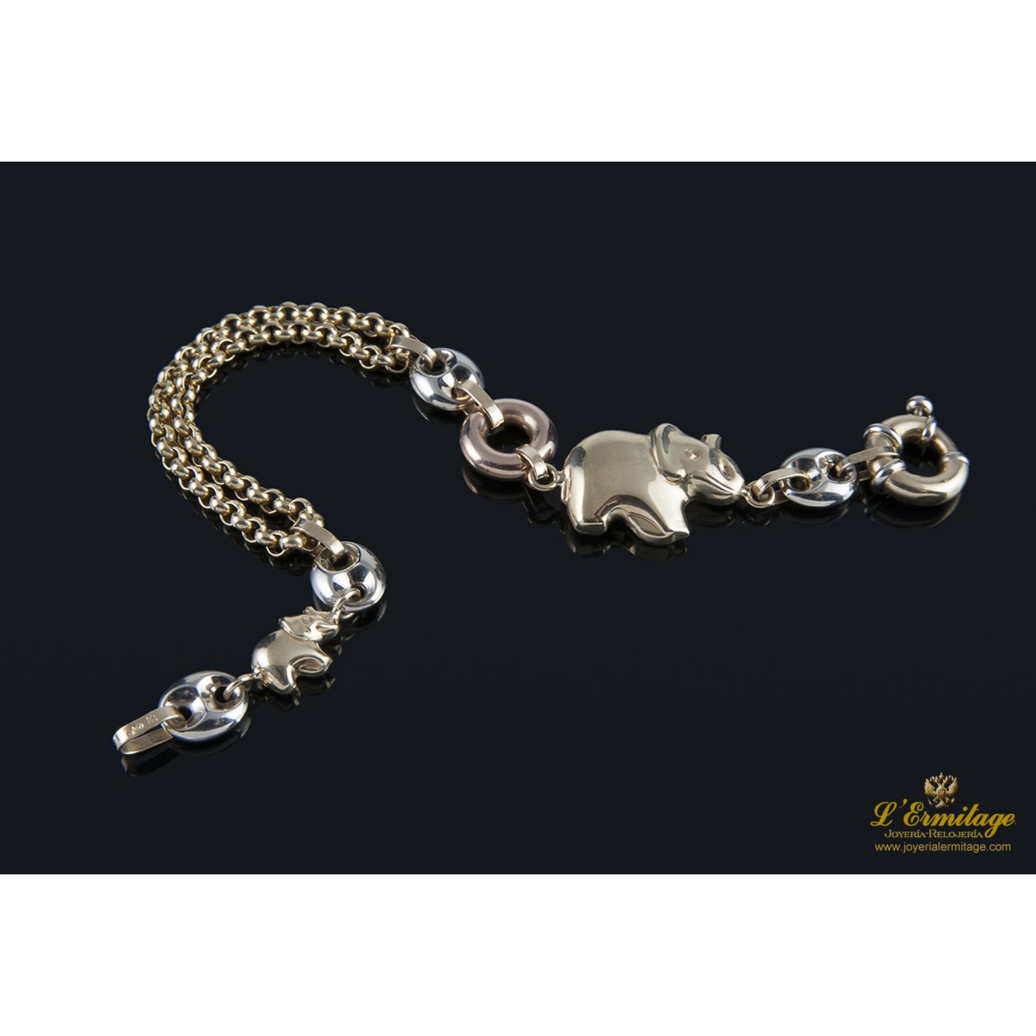 Pulsera tres oros con motivos referente a elefantes.