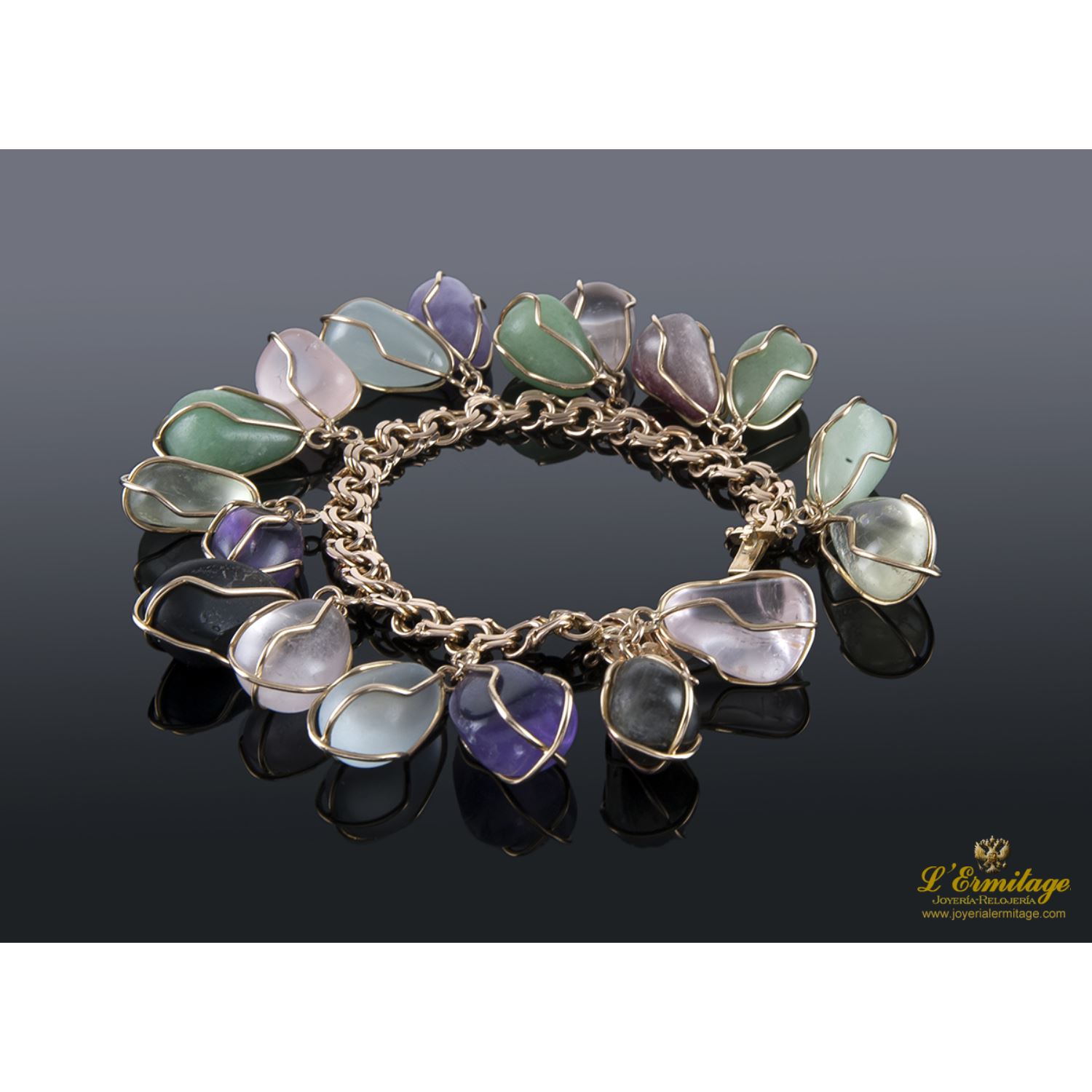 Pulsera en oro amarillo con cuarzos.