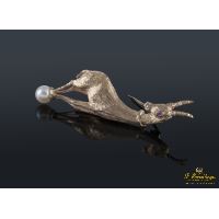 Broche en forma de cabra montesa.