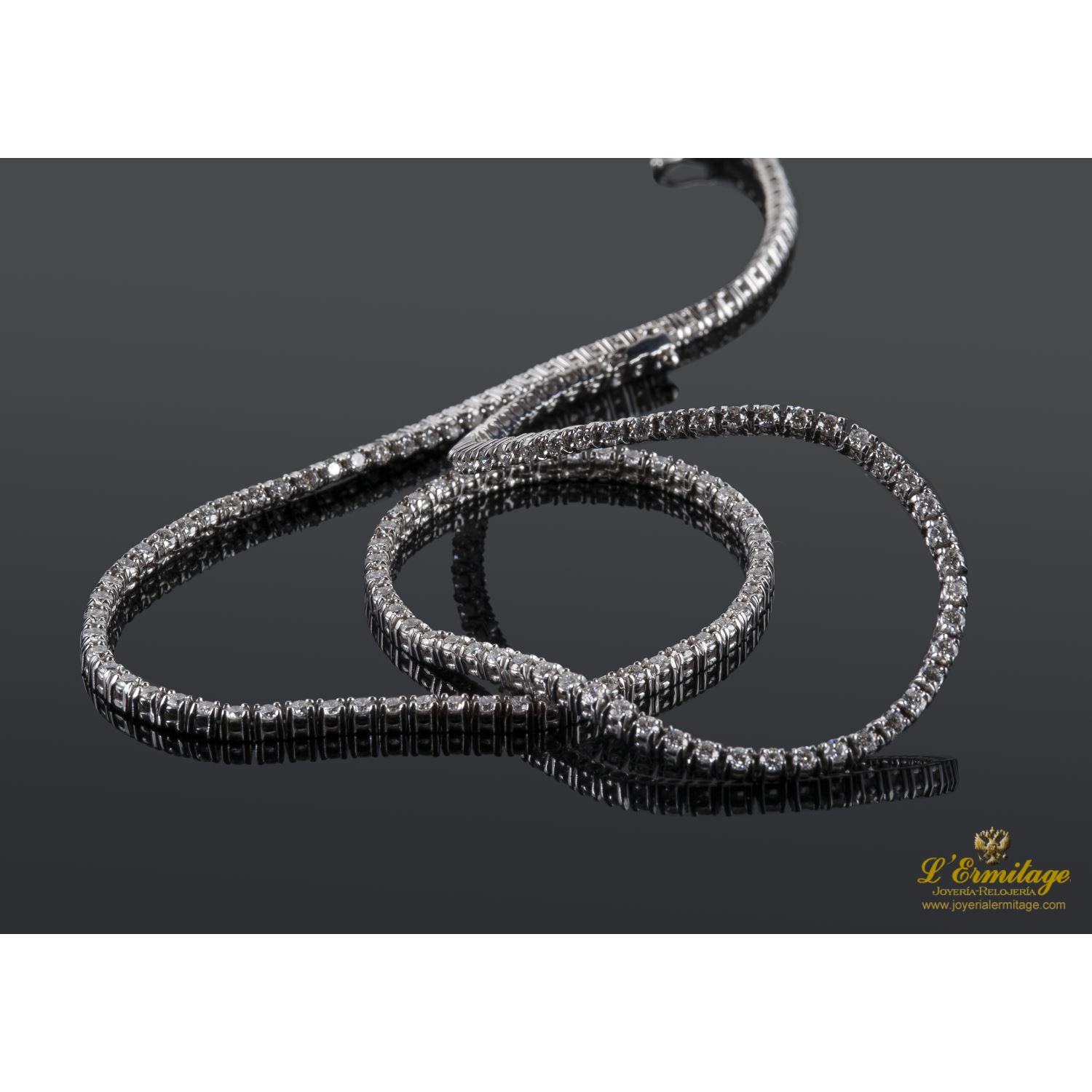 Gargantilla riviere oro blanco y diamantes. 40 Cm largo.