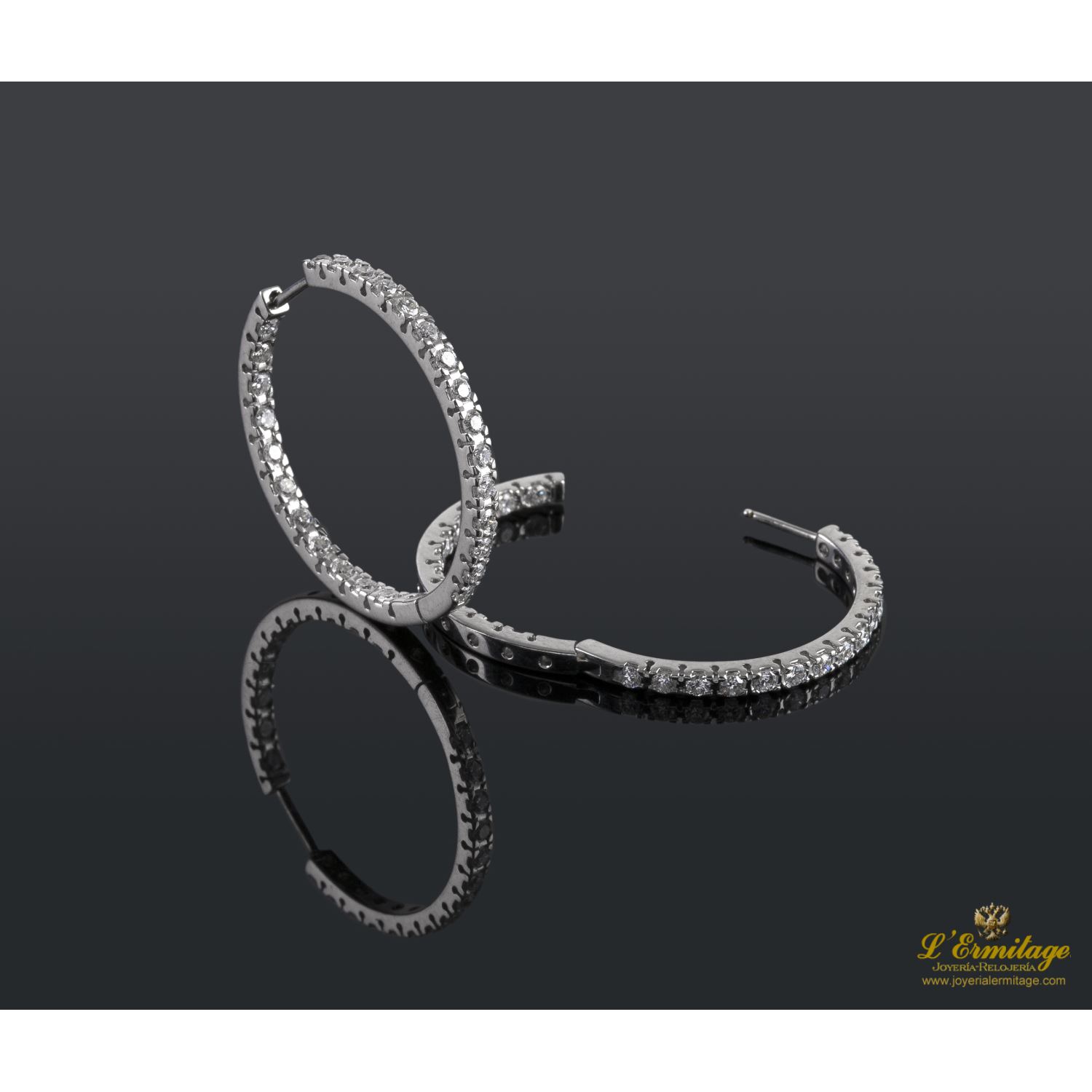 Pendientes criollas oro blanco y diamantes.