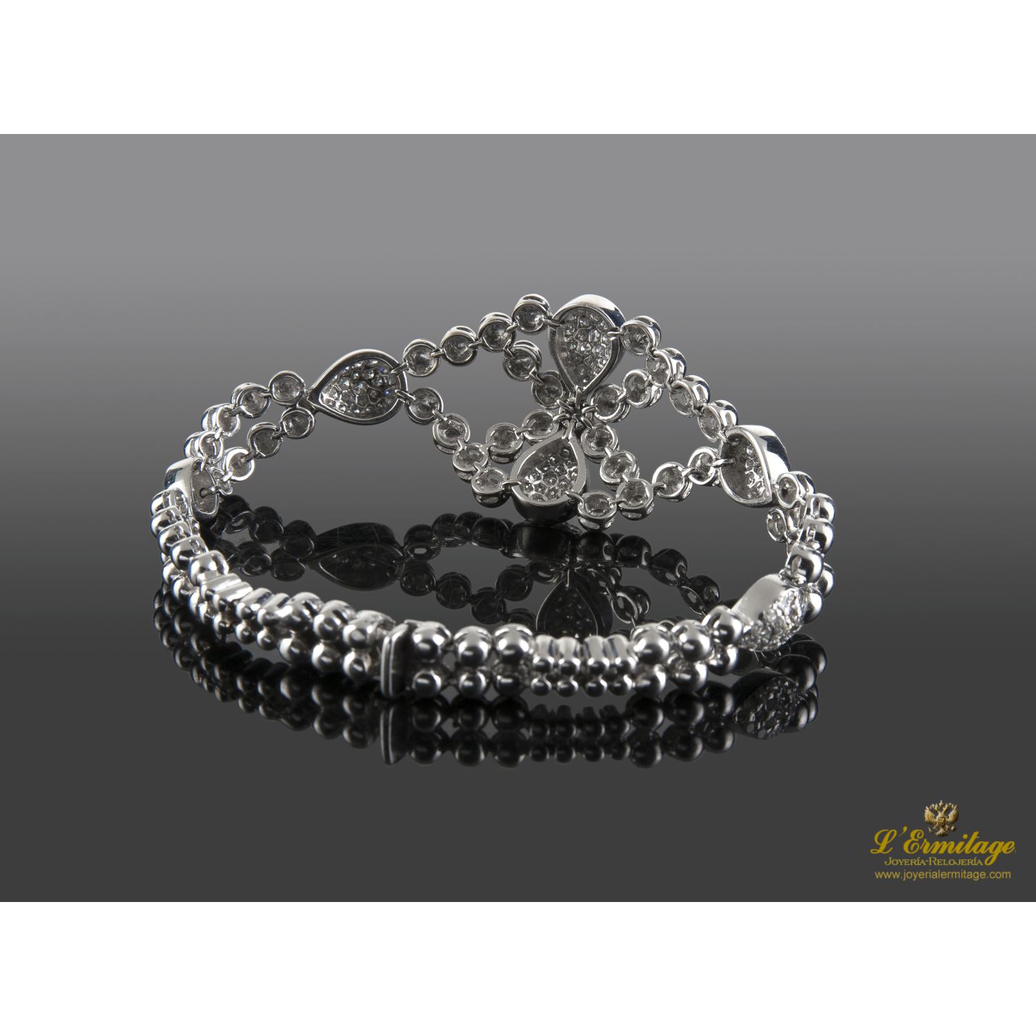 Pulsera oro blanco y diamantes.