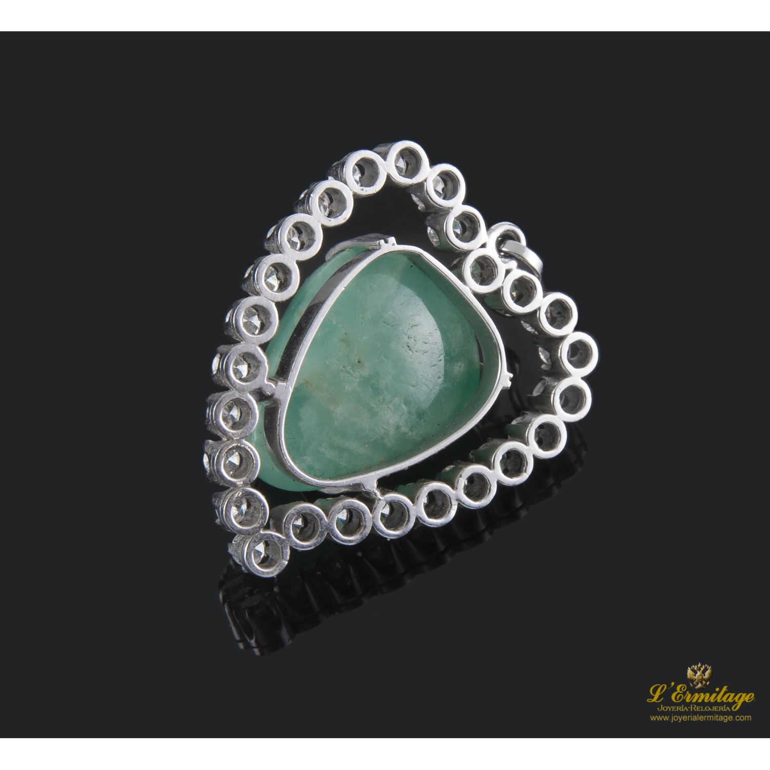 Colgante corazón oro blanco esmeralda y diamantes.