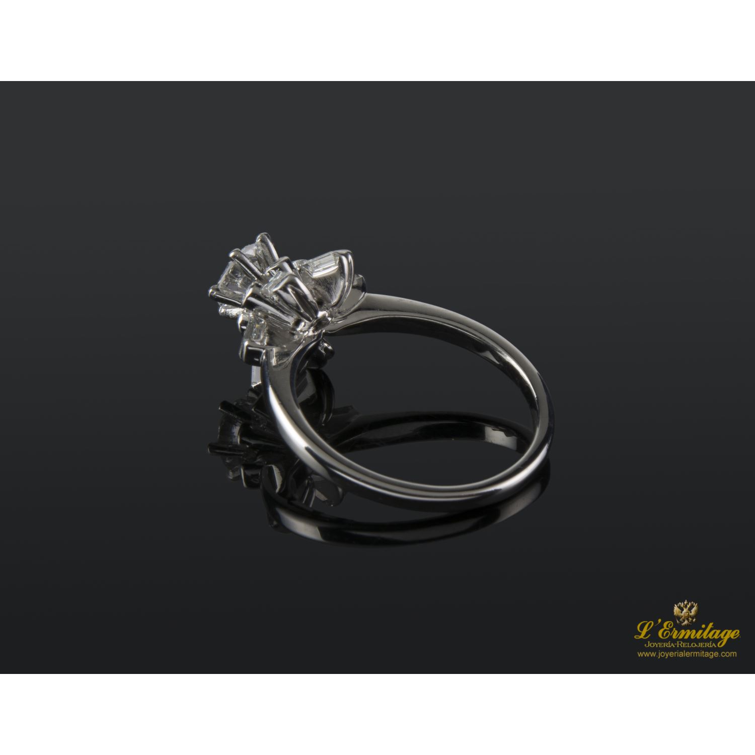 Sortija solitario oro blanco color i, pureza si1 y peso 0,70 cts.