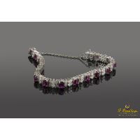 Pulsera oro blanco rubíes y diamantes.