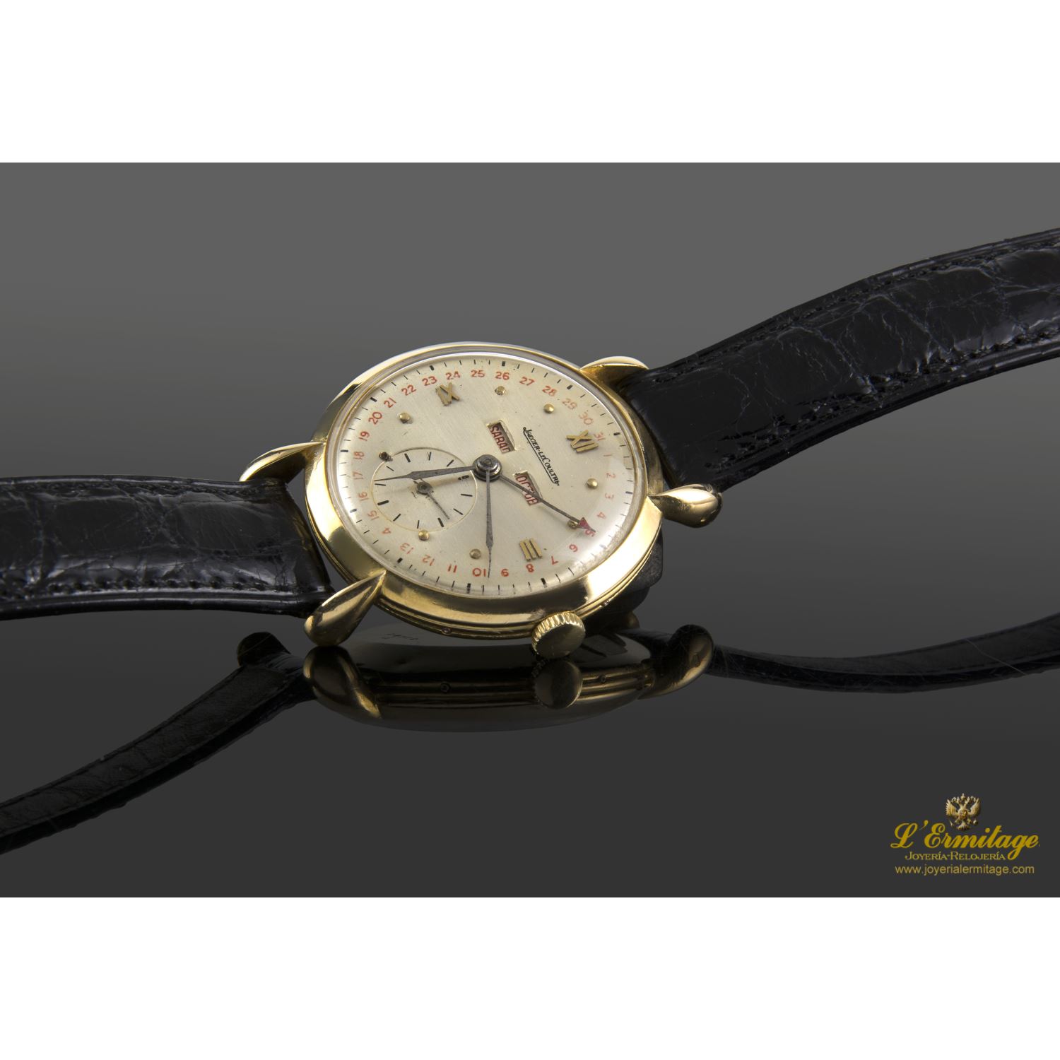 Triple calendario oro amarillo cuerda manual