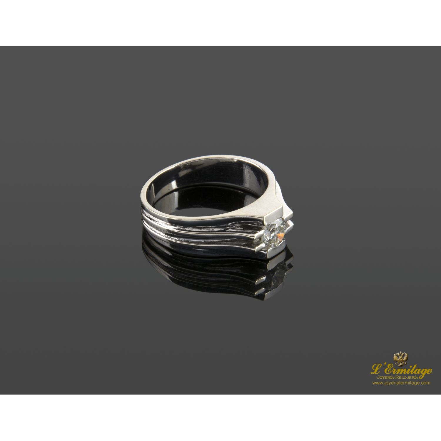 Solitario de caballero en oro blanco con un brillante
