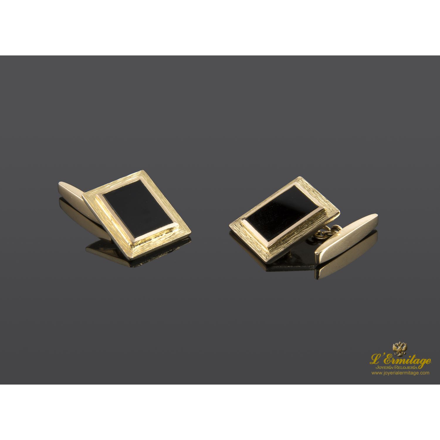 Gemelos en oro amarillo y onix