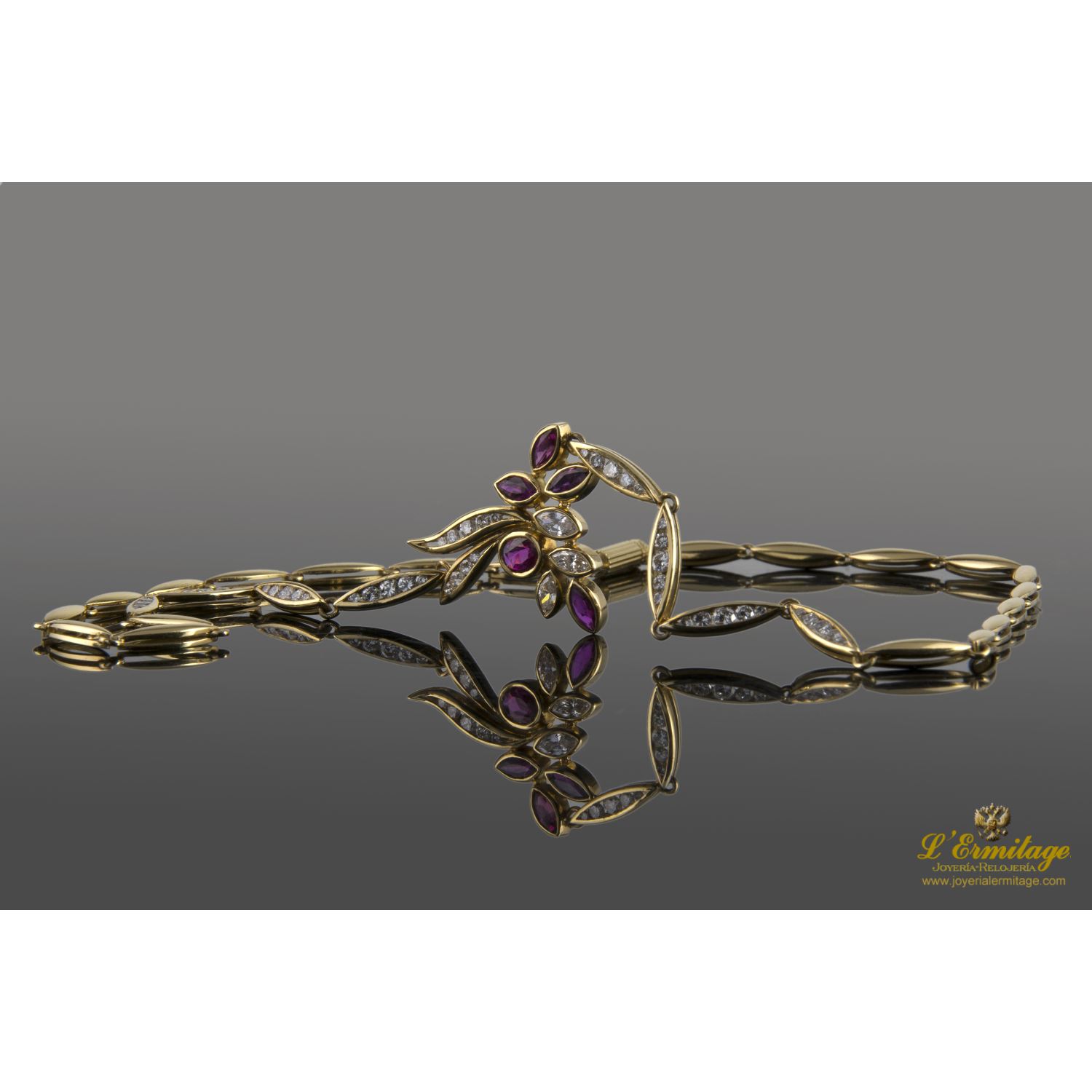 Gargantilla oro amarillo diamantes y rubíes