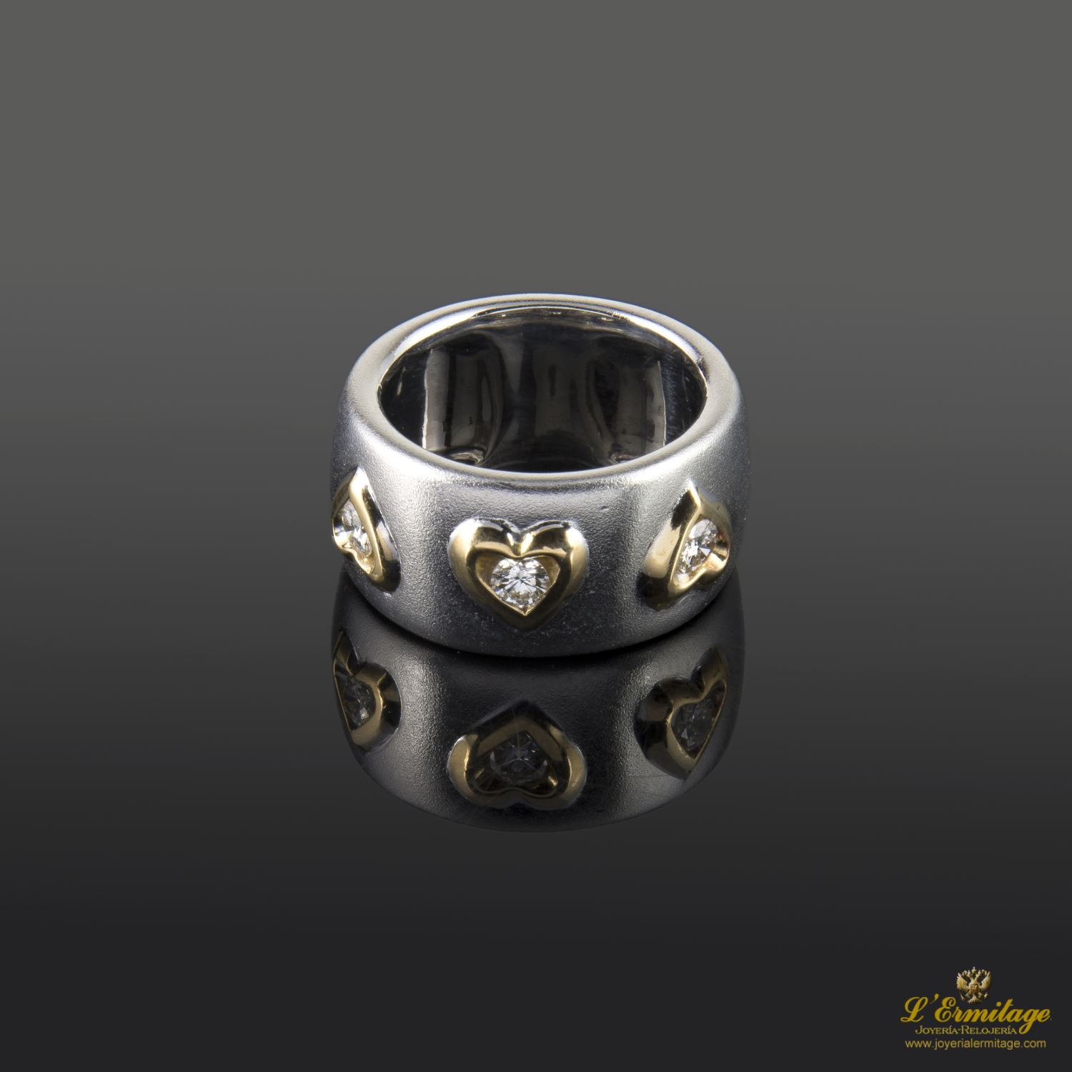 Sortija oro blanco satinado 3 diamantes naturales