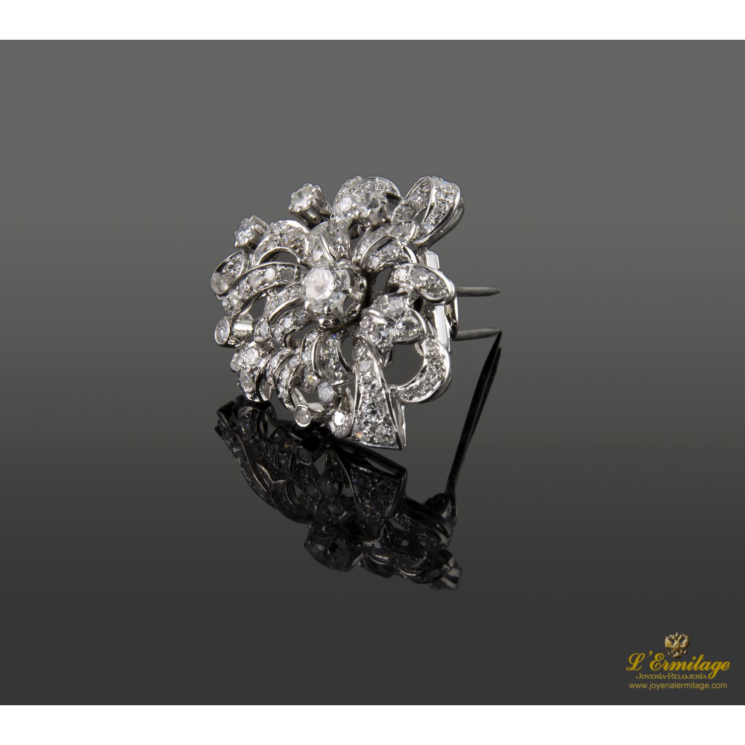 Alfiler oro blanco y diamantes