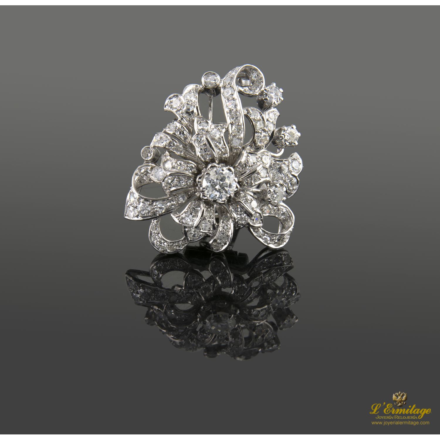 Alfiler oro blanco y diamantes