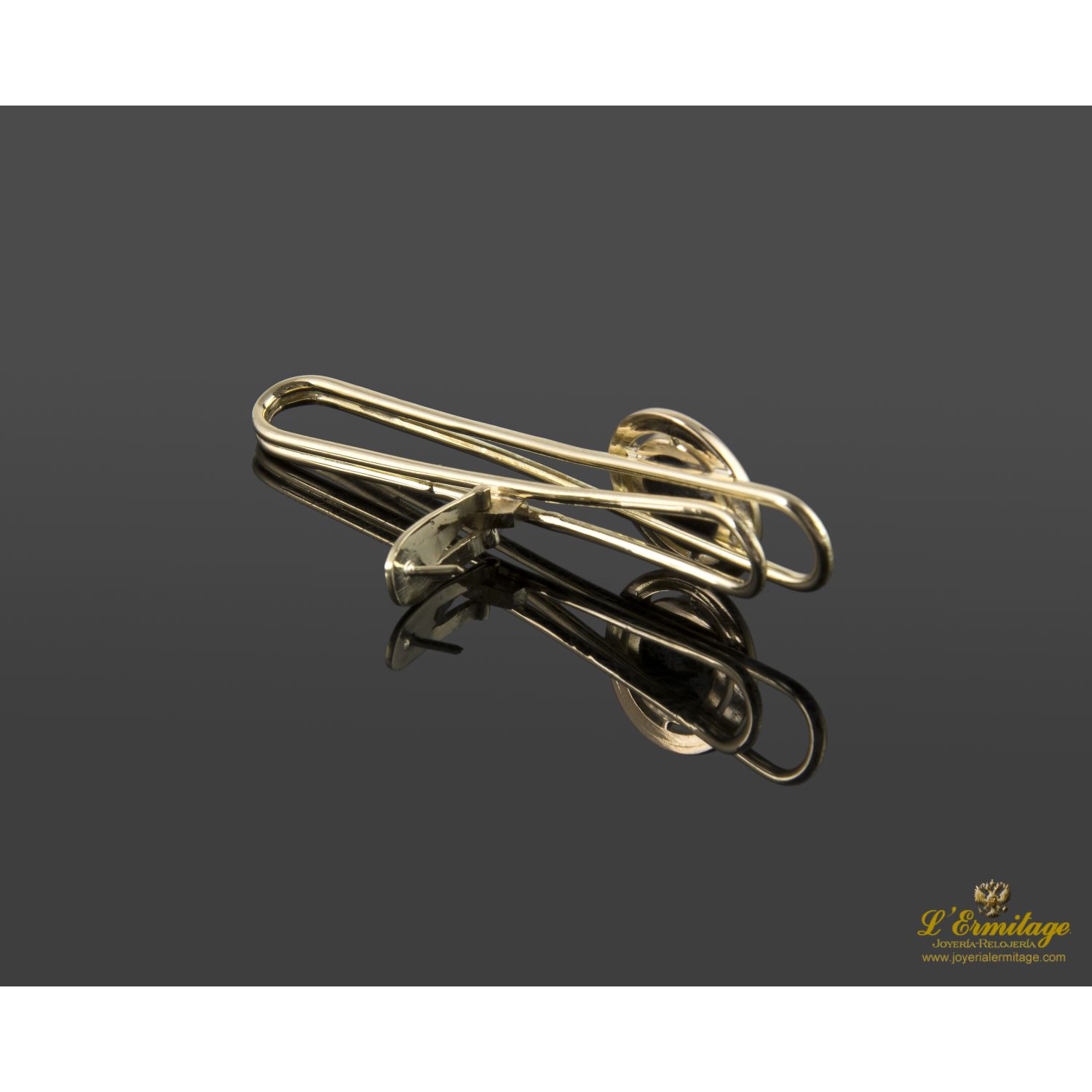 Pisacorbatas oro amarillo y ónix