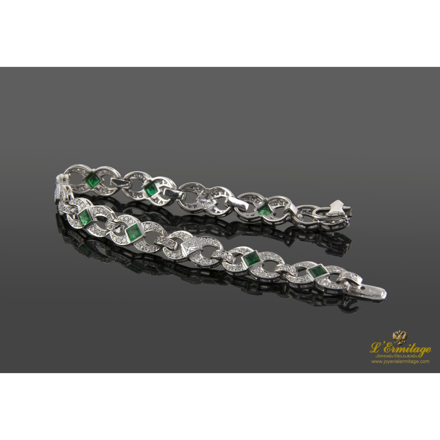 Pulsera oro blanco esmeraldas y diamantes.