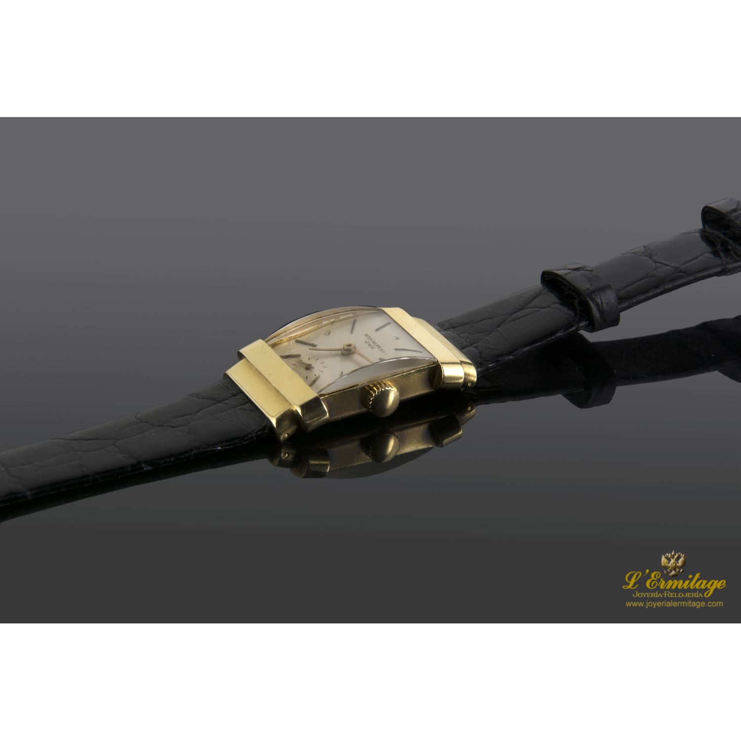 Top hat oro amarillo cuerda manual. 