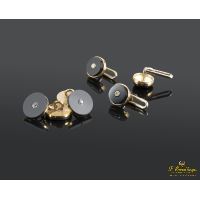 Botonadura oro amarillo ónix y diamantes.