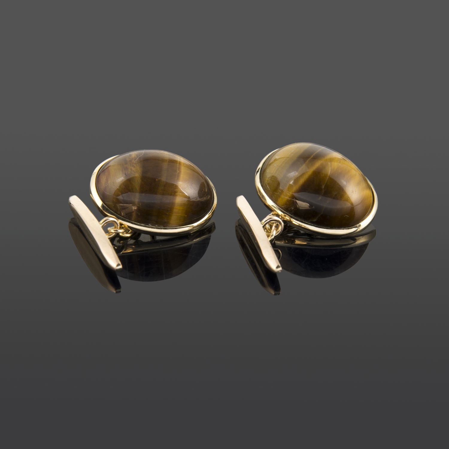 Gemelos ojo de tigre oro amarillo