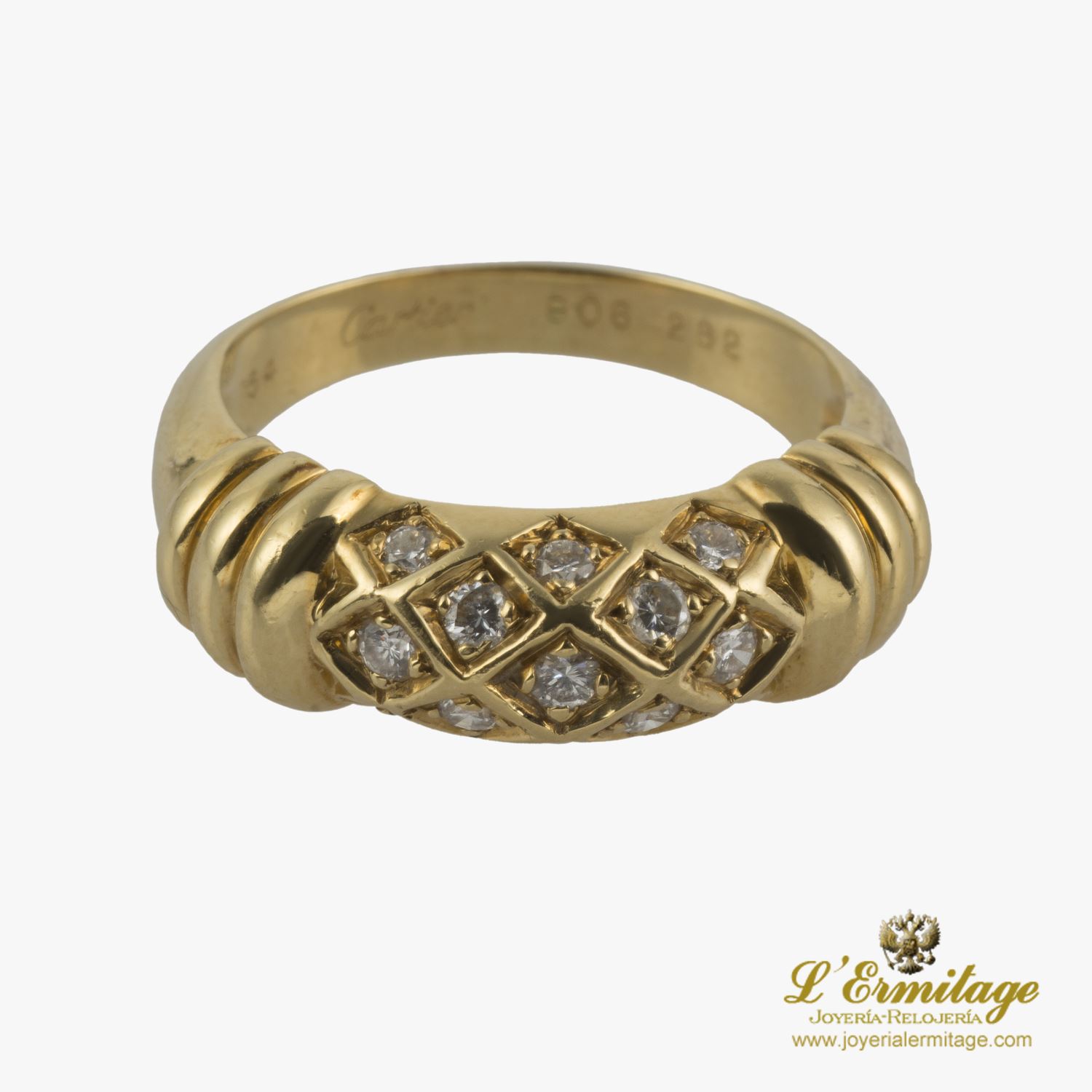 Anillo cartier oro amarillo y diamantes. Talla 54.