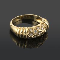 Anillo cartier oro amarillo y diamantes. Talla 54.