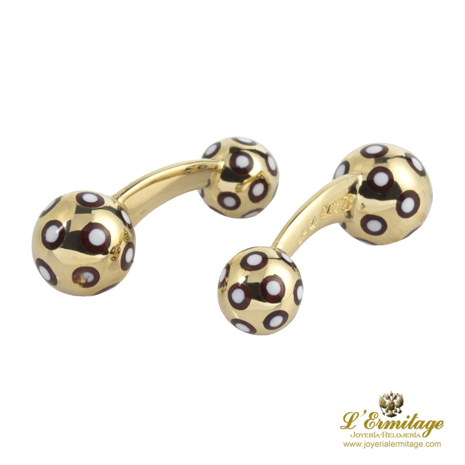 Gemelos firmados por yanes en oro amarillo y esmalte.