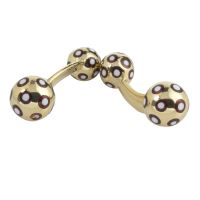 Gemelos firmados por yanes en oro amarillo y esmalte.