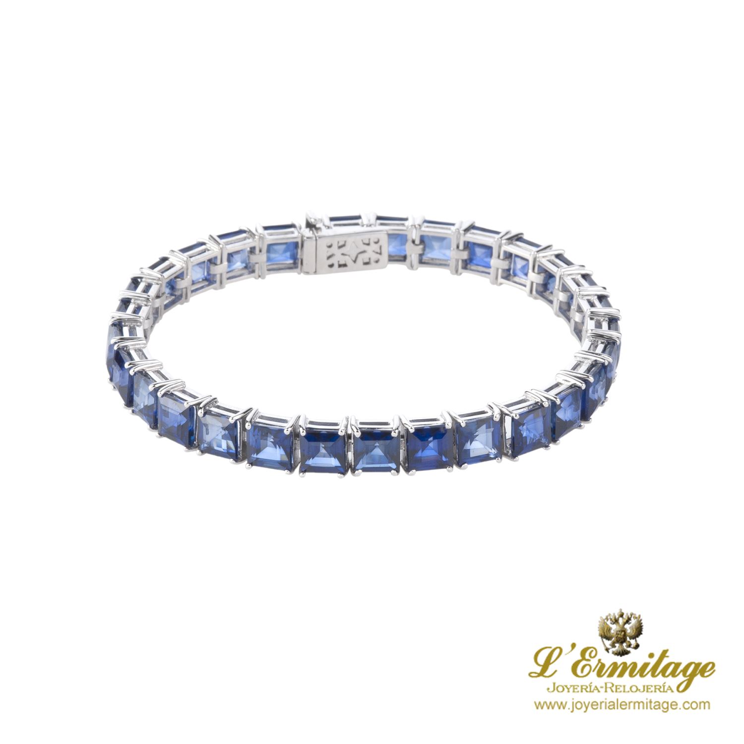 Pulsera riviere oro blanco y zafiros.