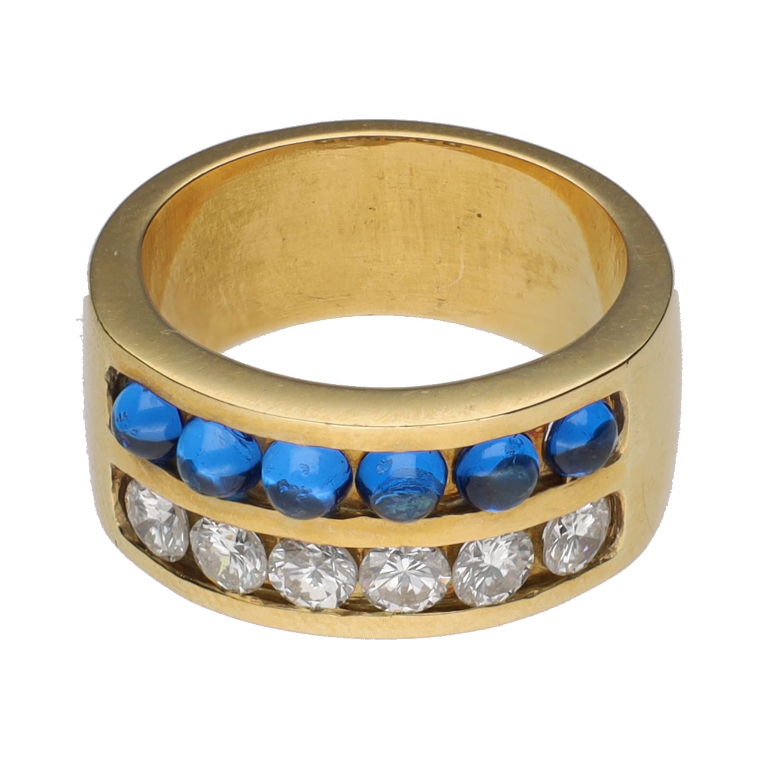 Sortija en oro amarillo con zafiros y brillantes. Talla 16.
