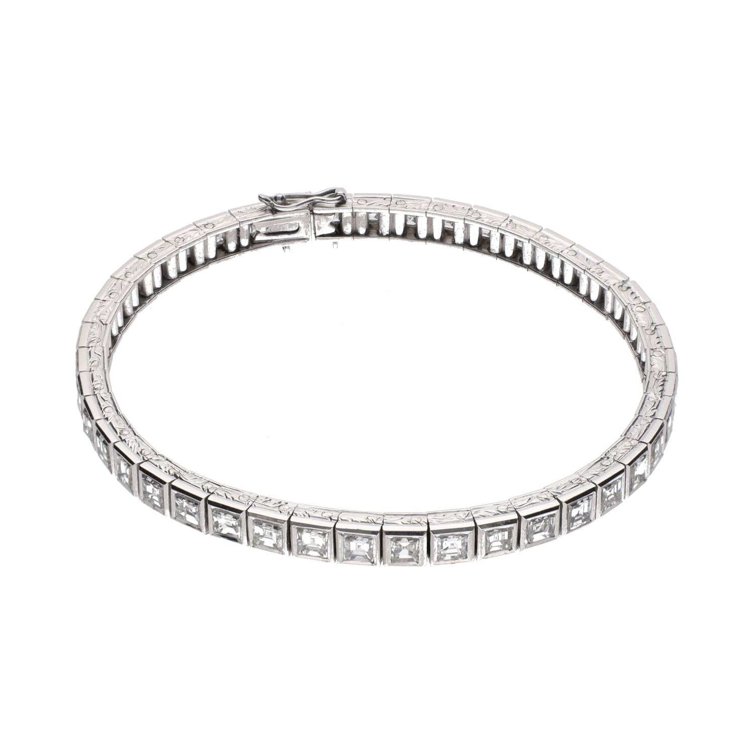 Pulsera riviere en oro blanco y diamantes naturales.