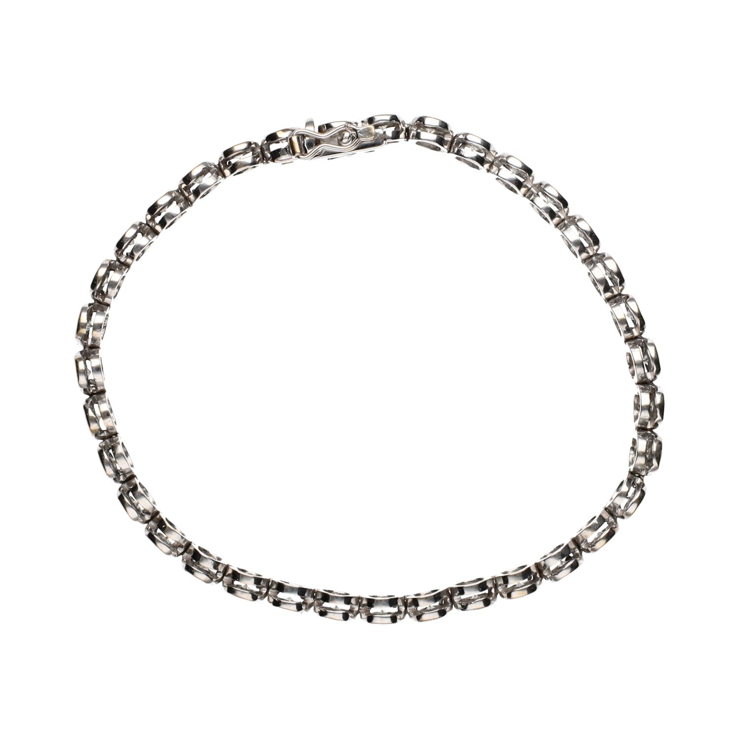 Pulsera riviere de brillantes en chatón.