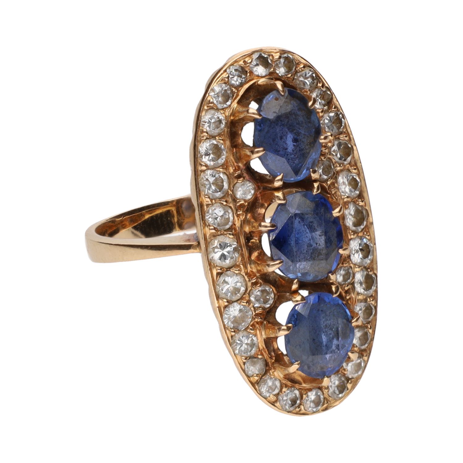 Sortija en oro amarillo con zafiros y diamantes. Talla 14.