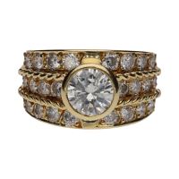 Sortija en oro amarillo y brillantes. Talla 12.