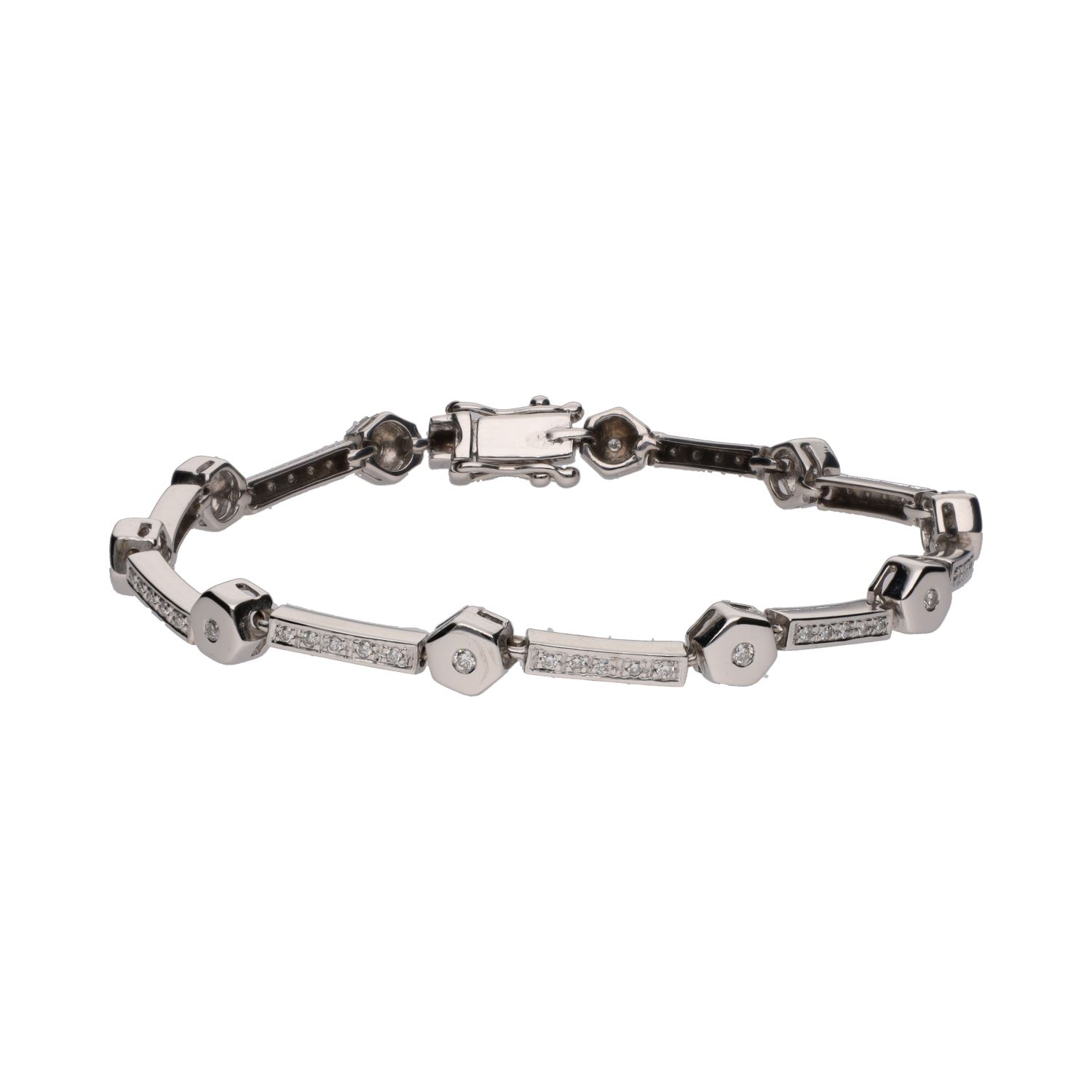 Pulsera en oro blanco con brillantes.