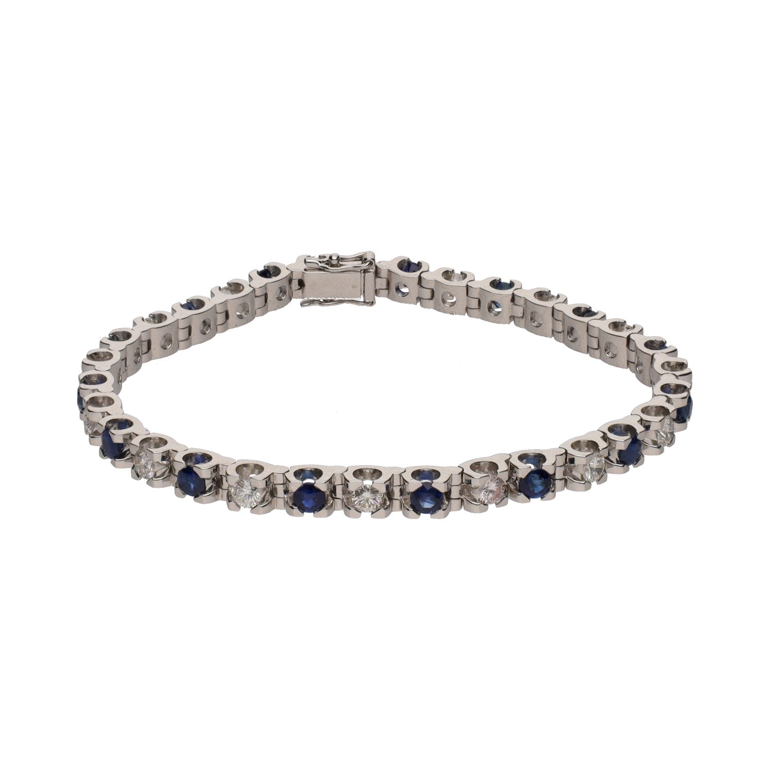 Pulsera en oro blanco con zafiros y brillantes.