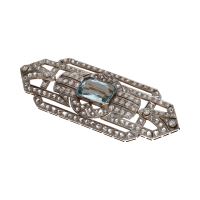 Broche antiguo en oro amarillo y oro blanco con aguamarina y diamantes.