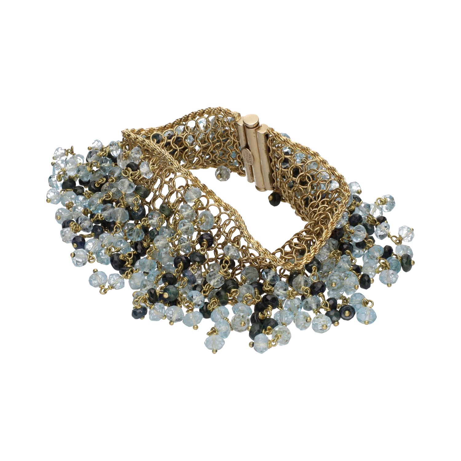 Pulsera en oro amarillo con bolitas de topacios y zafiros.